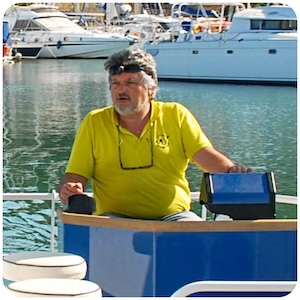 Eric Magré driving a solar boat